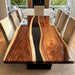 Live edge walnut epoxy dining table with black resin river
