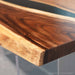 Luxury walnut resin dining table with natural live edge
