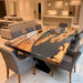 Olive wood dining table with smoky gray epoxy resin