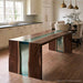 Black walnut epoxy waterfall table with a sculptural wood base and flowing teal resin details