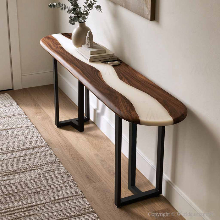 Modern entryway featuring a black walnut epoxy console table with white resin and neutral decorative accents