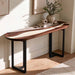 Close up of white epoxy resin alongside rich black walnut wood grain on a custom console table