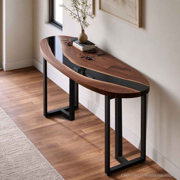 Modern entryway featuring a black walnut epoxy console table styled with a mirror and decorative accessories
