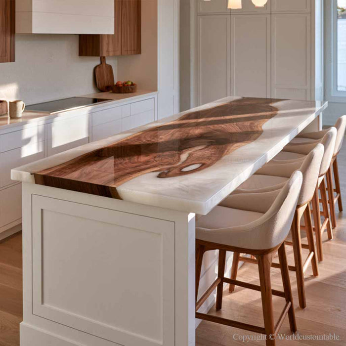 Luxury open concept kitchen featuring a custom black walnut island top with pearl white epoxy resin