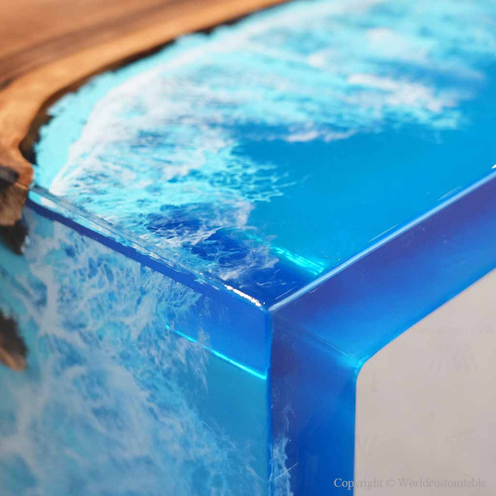 Sculptural waterfall edge on a black walnut epoxy console table with flowing ocean wave resin
