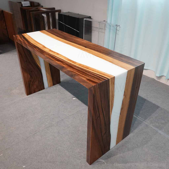 Modern entryway with a black walnut epoxy console table featuring white resin and a decorative mirror