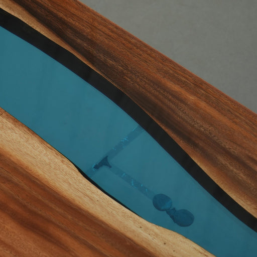 Modern epoxy river design on a sturdy walnut conference table.
