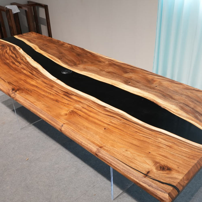 Modern black walnut epoxy dining table for contemporary interiors