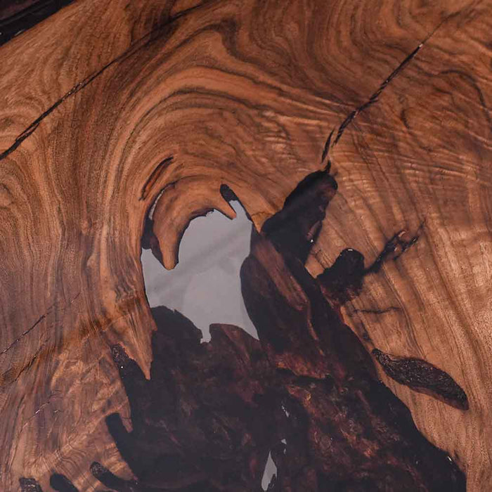 Detailed view of the live edge craftsmanship and smooth epoxy resin finish.