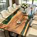 Spacious walnut wood conference table with green epoxy river, ideal for executive boardrooms and meetings.