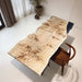 Wooden desk with a natural finish in a minimalistic room.