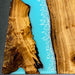 Ready-to-ship 47×80 Golden Camphor light blue epoxy resin dining table for 8 guests.