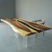 Handcrafted live edge walnut wood table with black epoxy resin