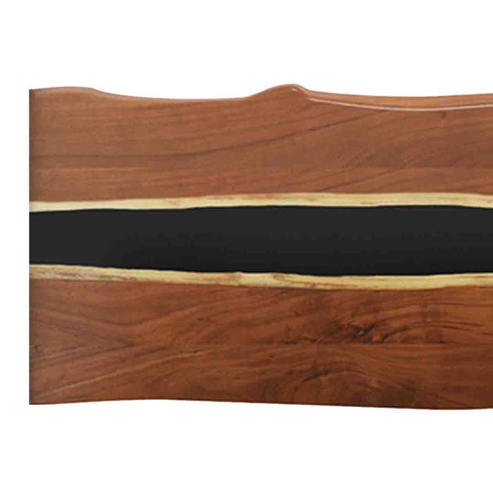 Wooden surface with black and gold inlay on a white background