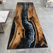 Premium live edge black walnut epoxy boardroom table designed for executive offices and modern meeting spaces.
