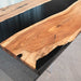 Live edge black walnut epoxy table in American style home interior design