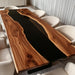 Live edge black walnut meeting table with glossy black resin center for boardroom