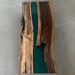 Black walnut resin dining table with handcrafted epoxy details