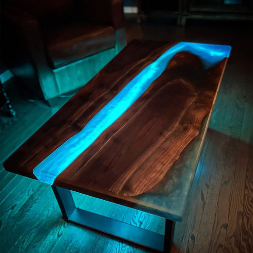 Live edge black walnut resin river table with glowing LED river