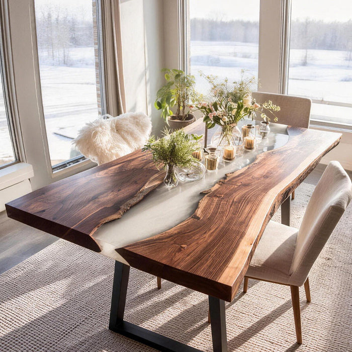 Dining room with a wooden table and chairs near large windows.