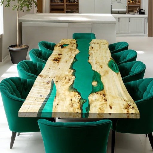 Live edge wood dining table with flowing green epoxy resin design.