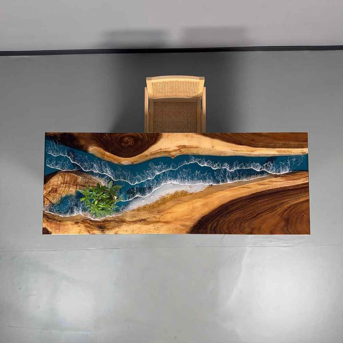 Wooden desk with a river design inlay on a gray background