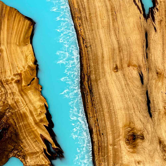 Detailed view of the live edge craftsmanship and smooth epoxy resin finish.