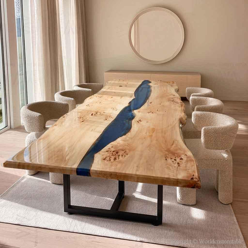 Live edge Poplar dining table with clear blue epoxy resin