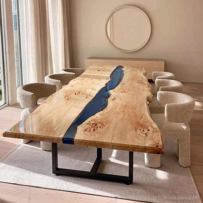 Live edge Poplar dining table with clear blue epoxy resin