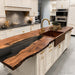 black walnut kitchen island top with black epoxy resin, live edge slab for custom luxury kitchen design