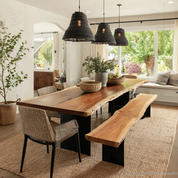 Modern dining room with wooden table, chairs, and bench in a well-lit room.