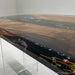 Live edge walnut dining table with black resin and flower elements, unique artisan epoxy wood table