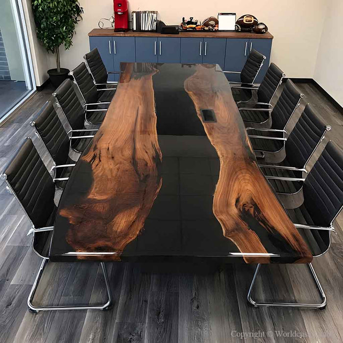 Live edge walnut boardroom table with embedded power outlet for modern business workspace