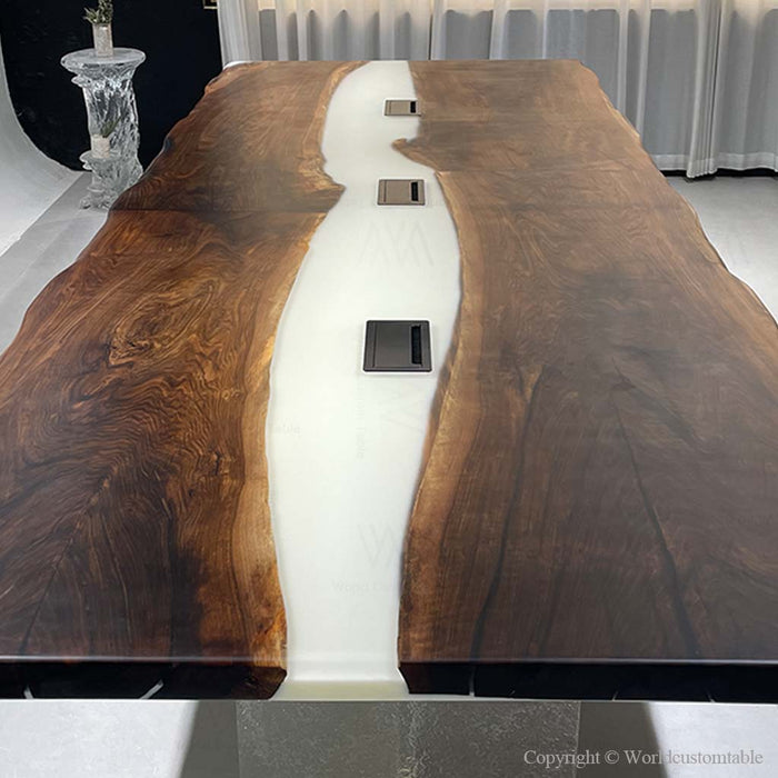 Live edge walnut conference table showcasing smart office design with integrated technology features.