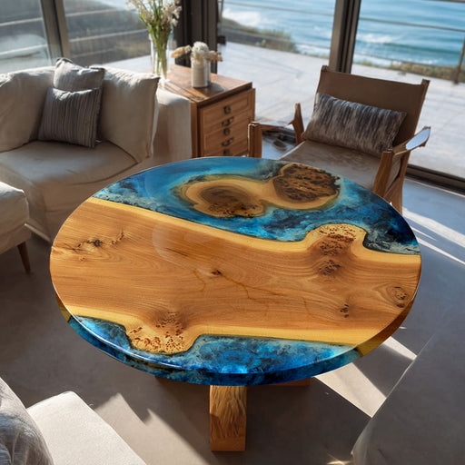 Wooden table with blue resin finish in a living room with ocean view