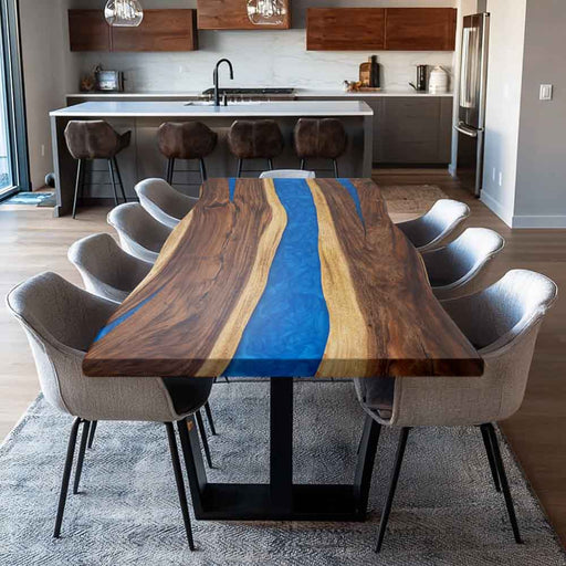 Dining room with a wooden table featuring a blue resin river design, surrounded by chairs.