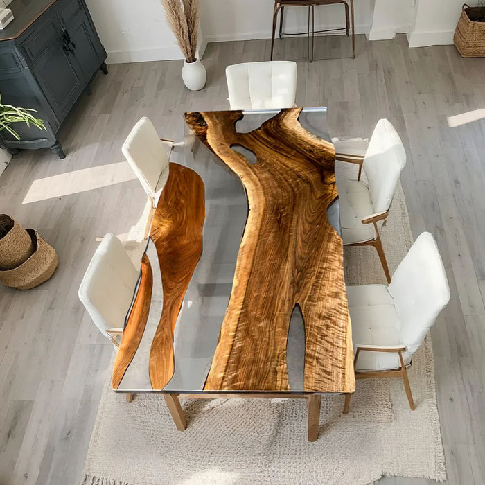 Live edge walnut resin dining table with clear epoxy in a modern home
