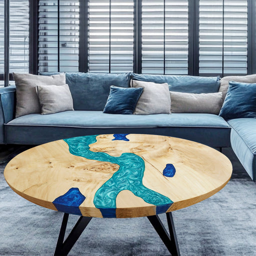 A rustic coffee table with live edge wood and epoxy river.