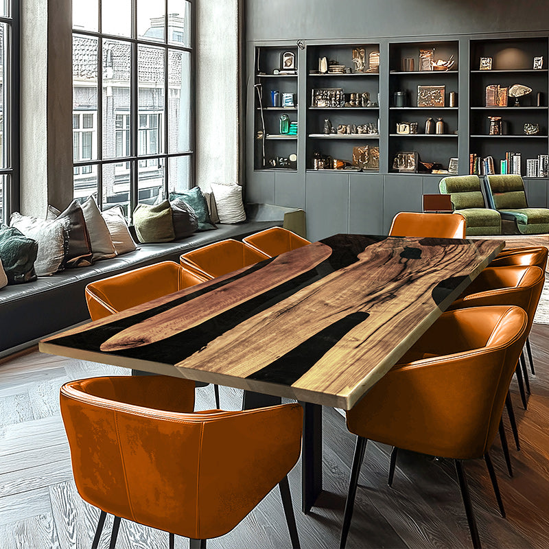 Live edge wood and black resin table with metal legs, featuring a modern industrial design.