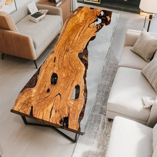 Exquisite live edge wood slab dining table featuring crystal-clear epoxy resin, showcasing natural wood textures and modern craftsmanship for luxury interiors.
