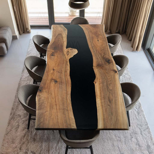 Dining room with a wooden table and chairs in a modern interior setting.