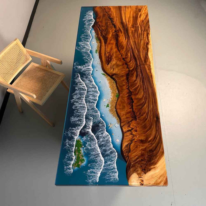 Wooden table with a river design on a white floor with a chair.