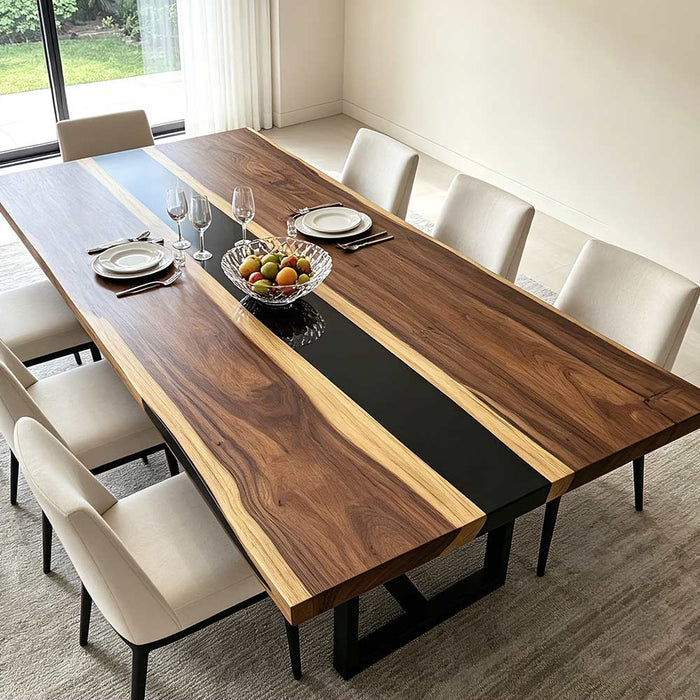 Contemporary walnut resin dining table styled in a Los Angeles interior setting.