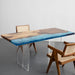 Luxury apartment dining table made of walnut and resin river