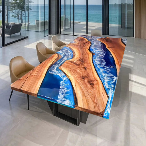 Epoxy resin table with crashing waves and rich walnut slab for beachfront interiors