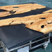 Luxury black resin olive wood coffee table for upscale interiors