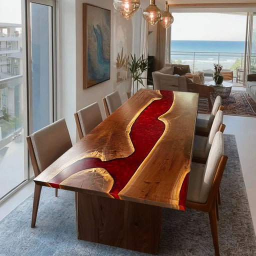 Dining room with a unique wooden table featuring a red resin inlay.