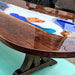 Luxury black walnut epoxy table with vibrant blue river design