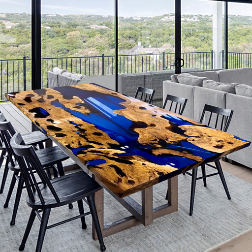 Luxury burl wood and blue epoxy resin dining table in modern living space