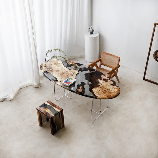 Custom oval resin and wood table in a luxury clubhouse